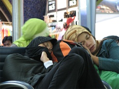 Passengers Resting in Airport Terminal
